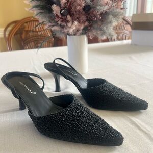 A. marinelli beaded pumps